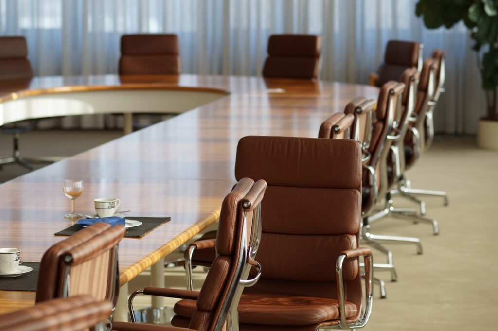 Empty meeting room with leather chairs